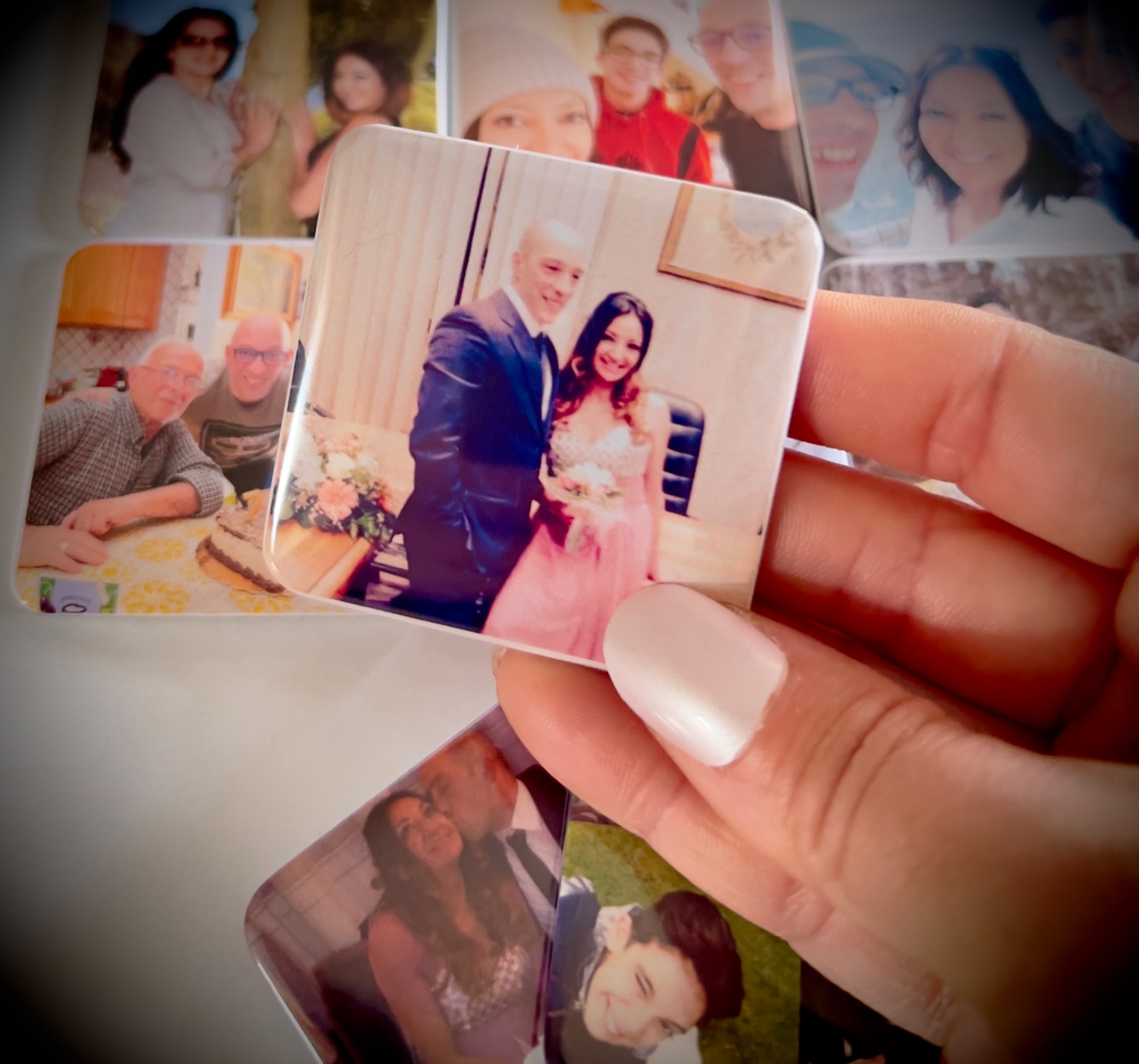 A personalised magnet held in hand